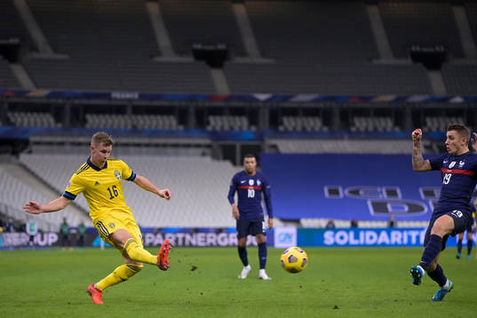 Emil Krafth of Sweden and Lucas Digne of France