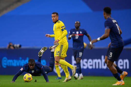 Kurt Zouma of France and Robin Quaison of Sweden