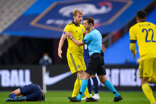 Filip Helander of Sweden reacts