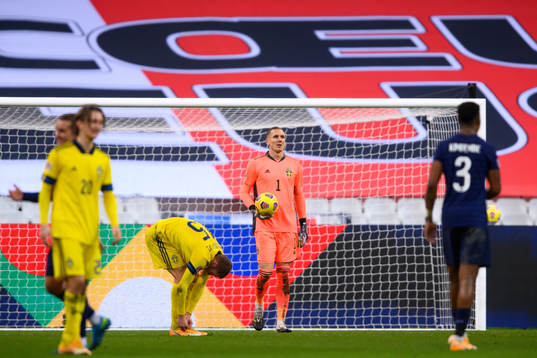 Goalkeeper Robin Olsen of Sweden looks dejected