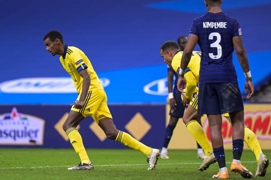 Alexander Isak and Robin Quaison of Sweden celebrate the