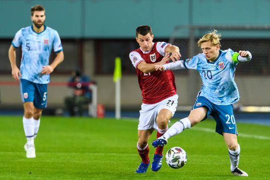 Stefan Lainer of Austria and Mats Møller Dæhli of Norway