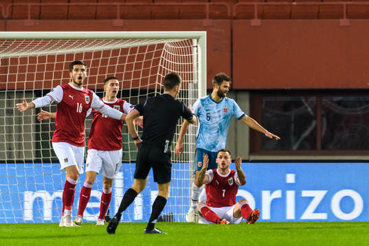 Adrian Grbic and Marko Arnautovic of Austria reacts against