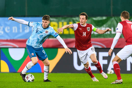 Jørgen Strand Larsen of Norway and Julian Baumgartlinger