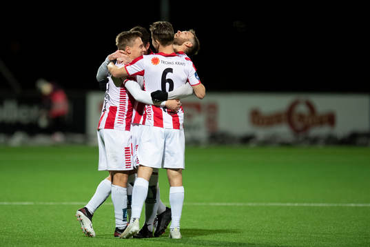Players of Tromsø celebrate