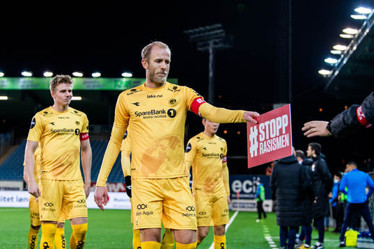 Vegard Leikvoll Moberg of Bodø/Glimt with a sign that