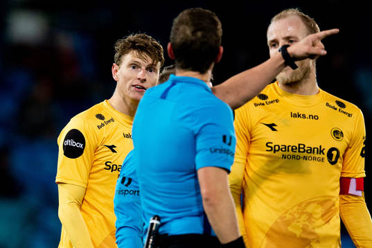 Kasper Junker of Bodø/Glimt argues with the referee