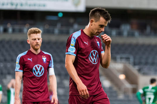 Malmö FFs Anders Christiansen och Jonas Knudsen deppar