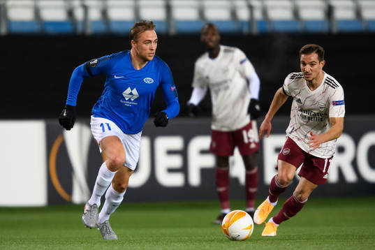 Martin Ellingsen of Molde and Cédric of Arsenal
