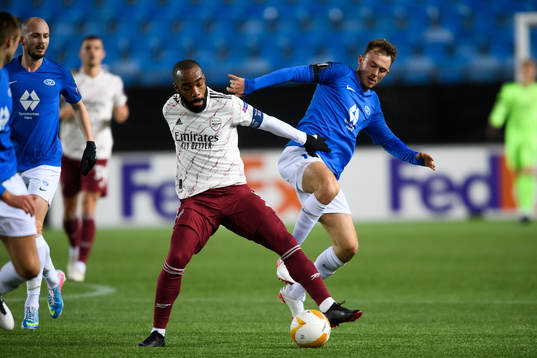 Alexandre Lacazette of Arsenal and Fredrik Aursnes of Molde