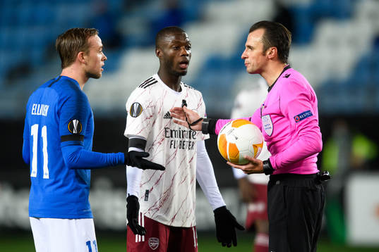 Martin Ellingsen of Molde and Alexandre Lacazette of
