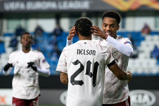 Reiss Nelson and Joe Willock of Arsenal celebrate the 0-2