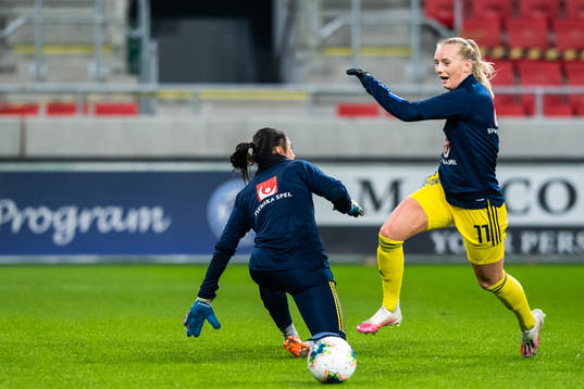 Goalkeeper Zecira Musovic and Stina Blackstenius of Sweden