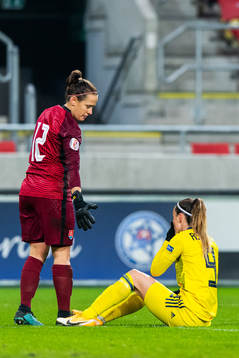 Goalkeeper Maria Korenčiová of Slovakia and Kosovare