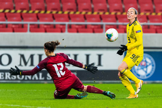 Goalkeeper Maria Korenčiová of Slovakia and Kosovare