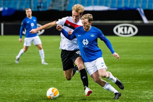 Greg Sloggett of Dundalk and Erling Knudtzon of Molde