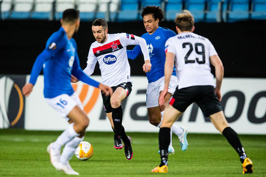 Michael Duffy of Dundalk and Henry Swenson Wingo of Molde