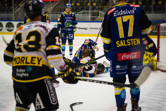 Sondre Bjerke of Storhamar and Brady Maurice Brassart of