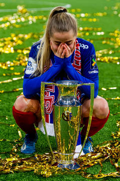 Sigrid Heien Hansen of Vålerenga celebrates winning the