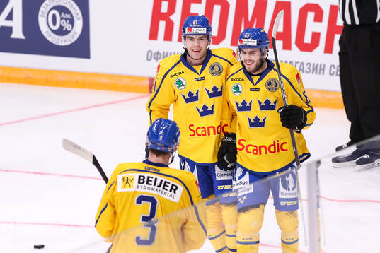 Magnus Pääjärvi and Pontus Åberg of Sweden celebrates