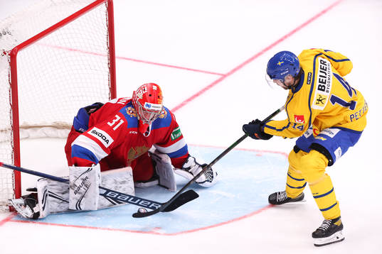 Emil Pettersson of Sweden against goalkeeper Alexander