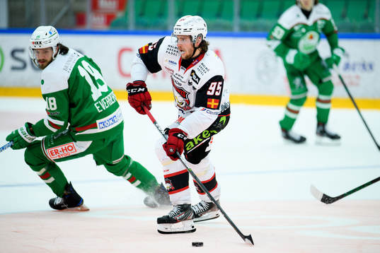 Rögles Dennis Everberg  och Malmö Redhawks Carl Persson