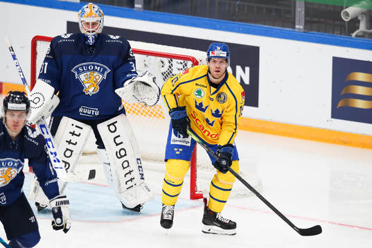 goalkeeper Janne Juvonen of Finland and Oskar Lindberg of