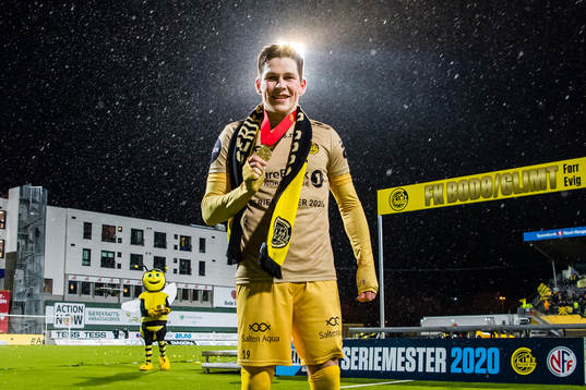 Sondre Brunstad Fet of Bodø/Glimt celebrates with his medal