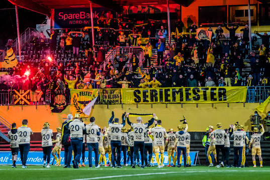 Spectators in the stands celebrates