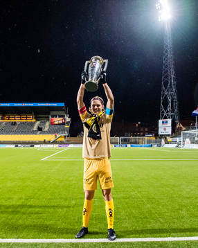 Ulrik Saltnes of Bodø/Glimt celebrates with the trophy