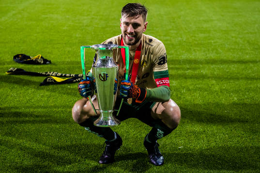 Nikita Haikin of Bodø/Glimt celebrates with the trophy
