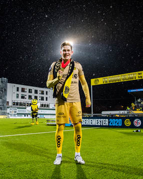 Sondre Brunstad Fet of Bodø/Glimt celebrates with his medal