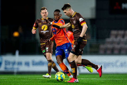 Parfait Bizoza of Aalesund and Christian Gauseth of