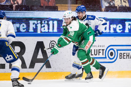 Rögles Dennis Everberg och ???under ishockeymatchen i SHL
