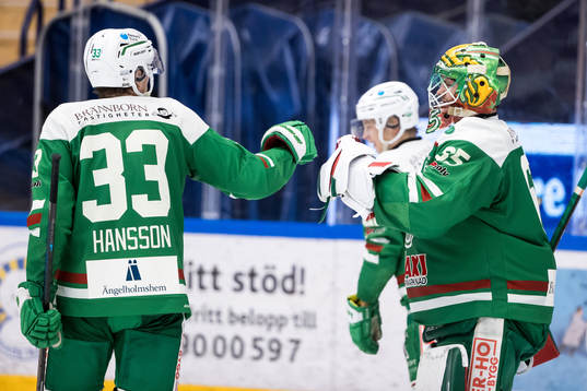 Rögles Niklas Hansson och Rögles målvakt Christoffer