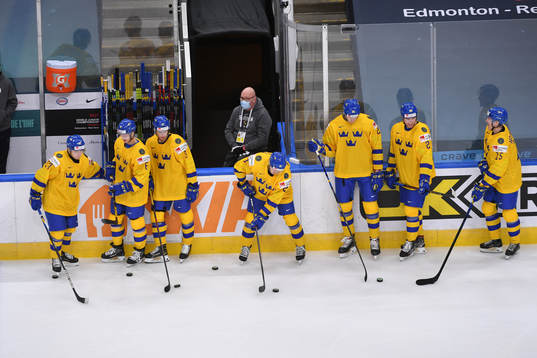 Team Sweden players warm up prior to the 2021 IIHF World