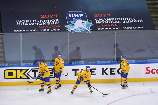 Team Sweden players warm up prior to the 2021 IIHF World