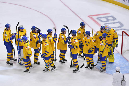 Team Sweden celebrates their 7-1 victory