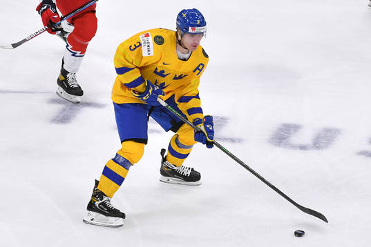 Tobias Björnfot of Sweden carries the puck