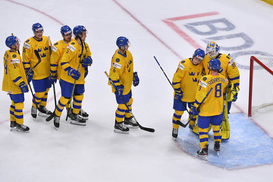 Team Sweden celebrates their 7-1 victory