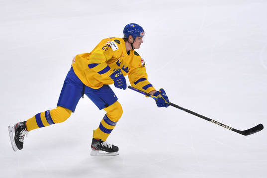 Elmer Söderblom of Sweden shoots the puck