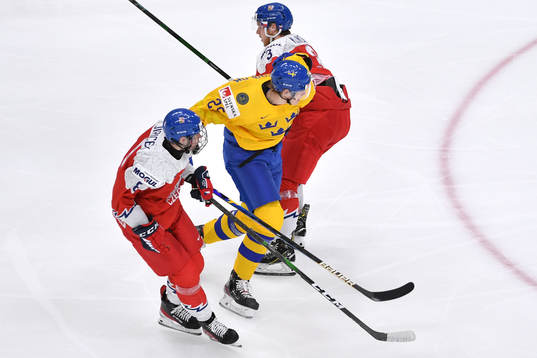 Elmer Söderblom of Sweden barges thru Karel Klikorka and