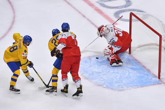 Lucas Raymond and Albin Sundsvik battle in front of the net