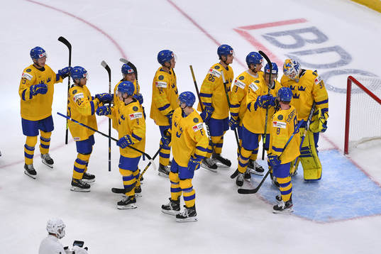Team Sweden celebrates their 7-1 victory