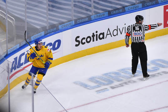 Arvid Costmar celebrates a first period goal