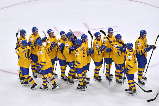 Team Sweden celebrates their 7-1 victory