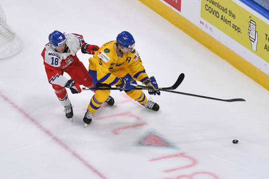 Tobias Björnfot battles for the puck