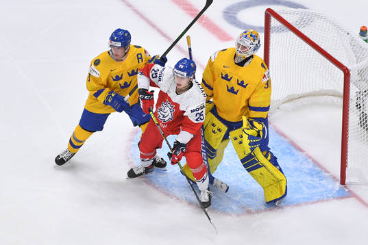 Tobias Björnfot battles for position in front of the net