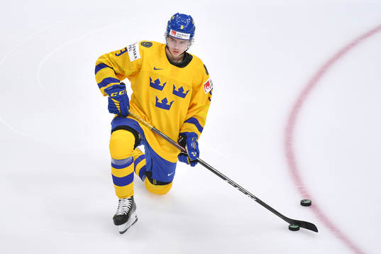 Albert Johansson of Sweden stretches prior the 2021 IIHF