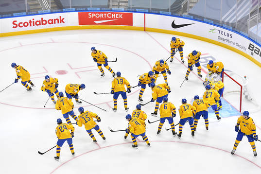 Team Sweden takes to the ice prior to the 2021 IIHF World